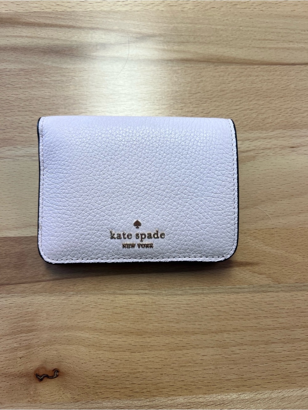 kate spade Light Pink Pebbled Leather wallet with Gold Logo
